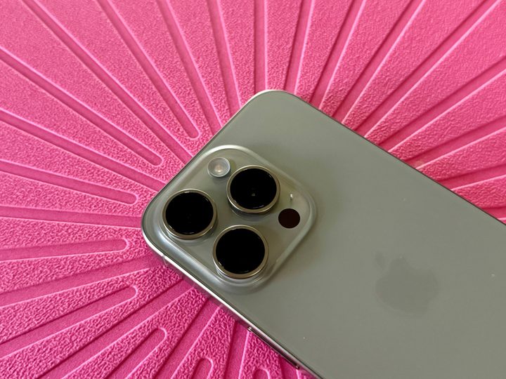 Natural Titanium iPhone 15 Pro camera module.