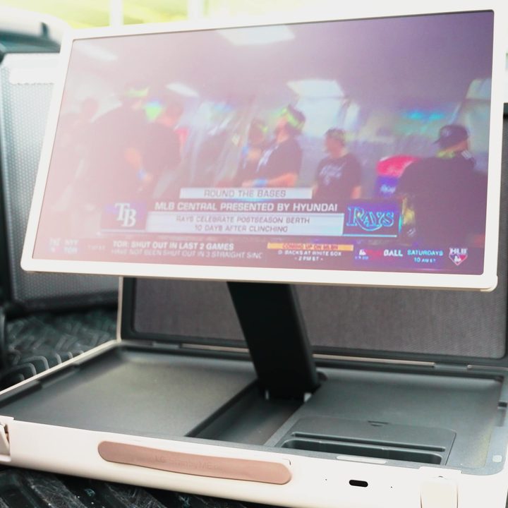 The LG StanbyMe Go monitor extended from its case.