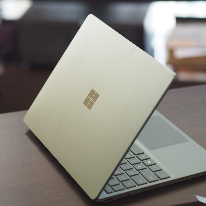 Microsoft Surface Laptop Go 3 rear view showing lid and logo.