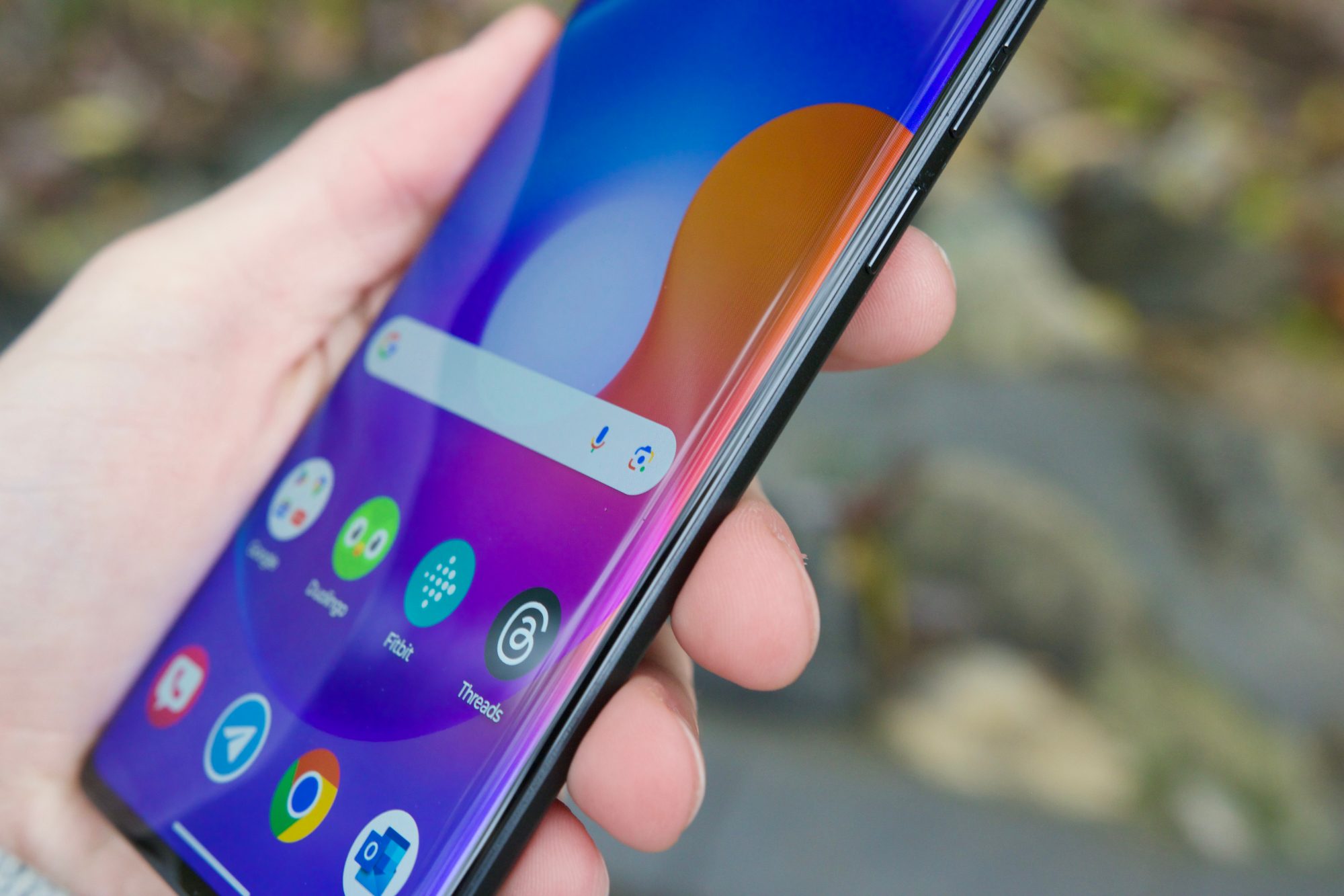 A close-up view of the curved screen on the Motorola Edge (2023).