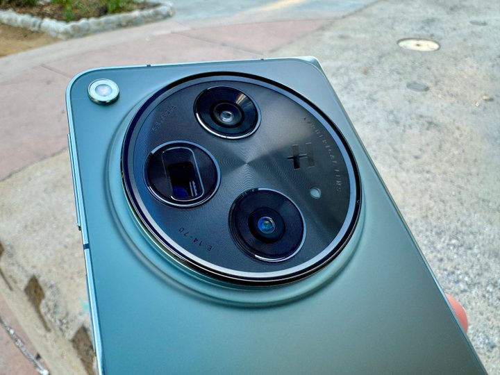 OnePlus Open in Emerald Dusk showing closeup of camera.