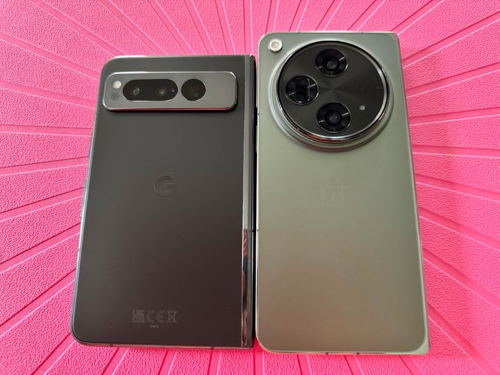 OnePlus Open and Google Pixel Fold side by side to show back and design.