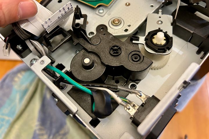A gear module that needs to be removed before you can get to the roller assembly.