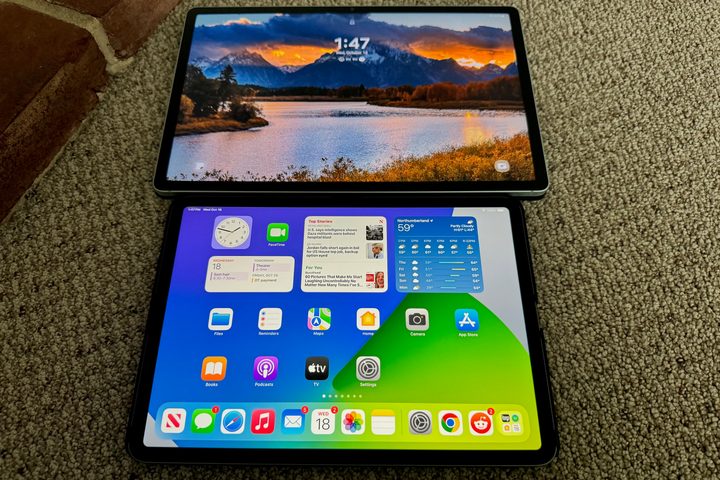A Samsung Galaxy Tab S9 FE+ above a 11-inch iPad Pro.
