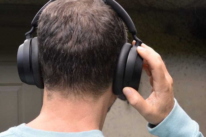 Simon Cohen wearing Sennheiser Accentum Wireless headphones (rear view).