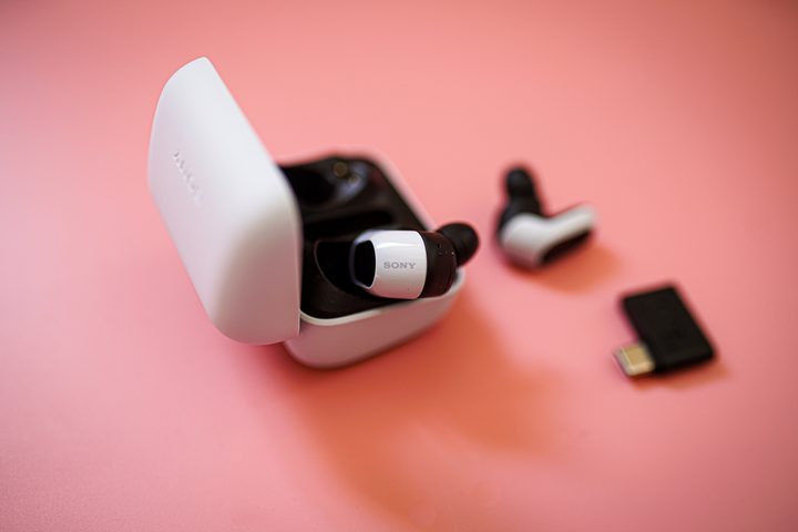 One earbud sticking out of the case for the Sony InZone Buds.