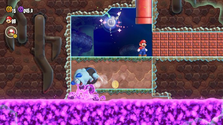 Mario stands near a Wonder Seed in Super Mario Bros. Wonder.
