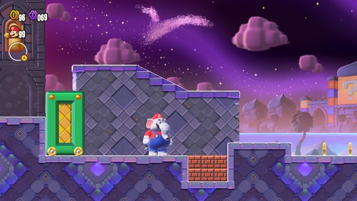 Elephant Mario stands near some blocks in Super Mario Bros. Wonder.