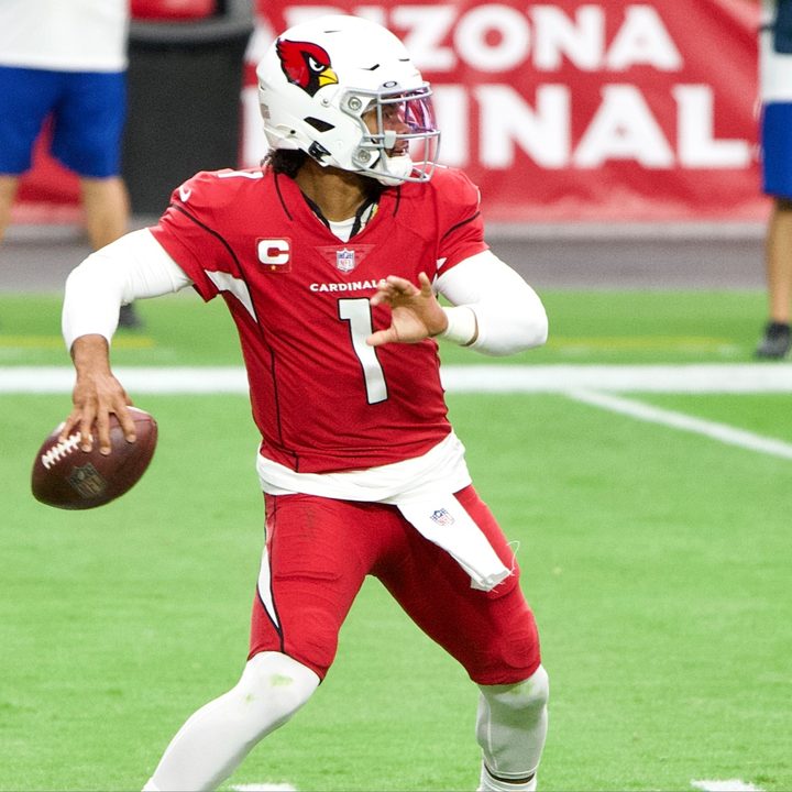 Kyler Murray prepares to throw a football.