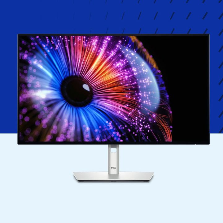 Press image of the Dell Ultrasharp 27 Thunderbolt Hub Monitor U2724DE on a blue background.
