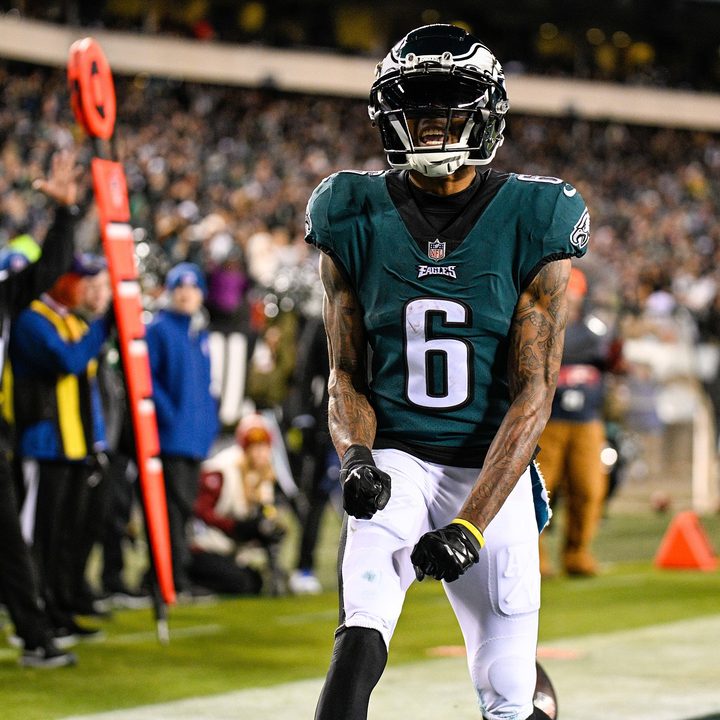 DeVonta Smith of the Philadelphia Eagles flexes in the end zone.
