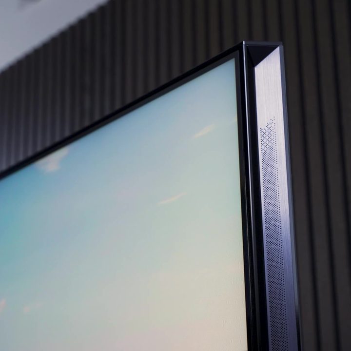 The top right corner of a Hisense UX TV showing the in-built speaker.