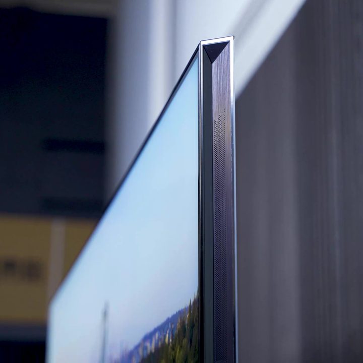A profile view of the panel and in-built speaker of a Hisense UX TV.