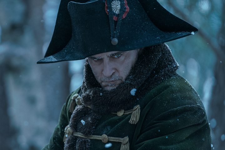 Joaquin Phoenix wears a green coat in Napoleon.