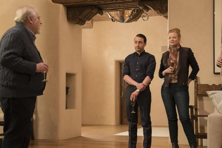 Logan, Roman, and Shiv standing in a room in Austerlitz in Succession