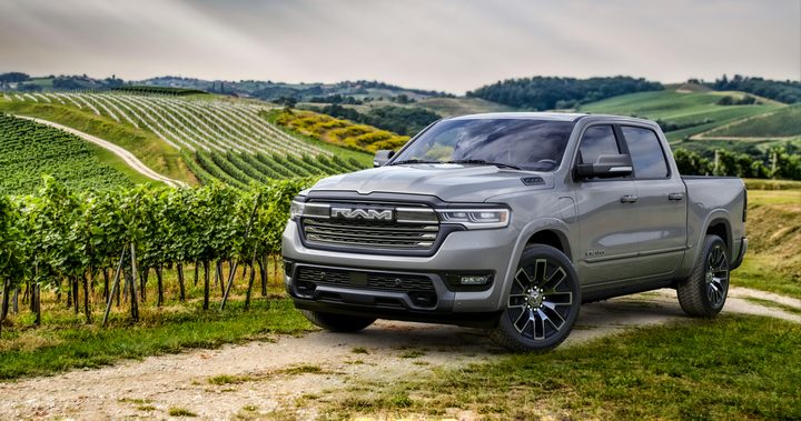 A 2025 Ram 1500 Ramcharger sits in a vineyard.