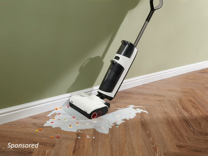 Roborock Dyad Pro cleaning up against baseboards wet spill sponsored