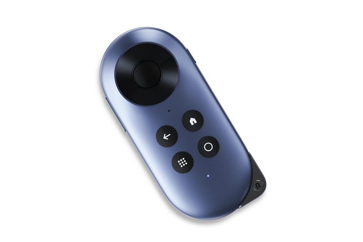 Rokid Station Android TV accessory appears on a white background.