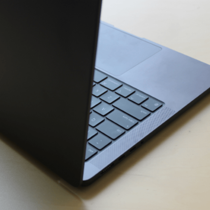 The keyboard, speakers, and trackpad of the MacBook Pro.