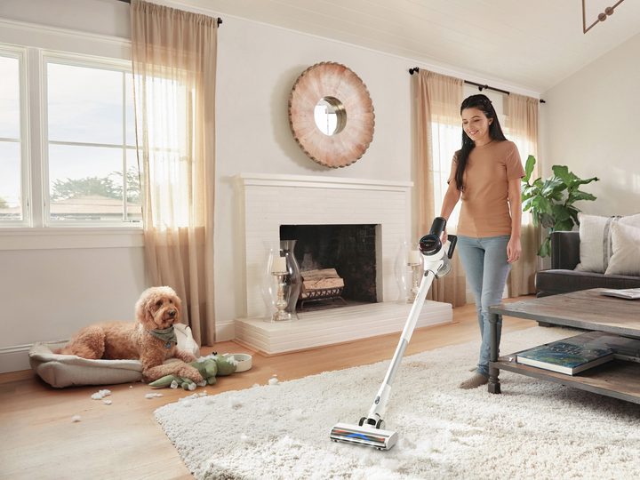 Tineco PURE ONE S15 Essentials woman using to clean pet mess