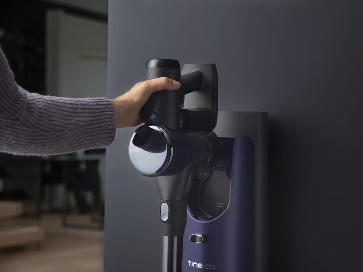 Tineco PURE ONE Station being put away on charger