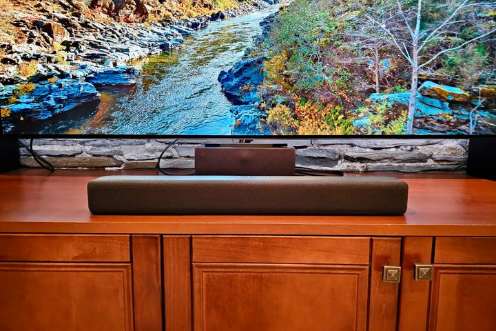 Amazon Fire TV Soundbar in front of TV.