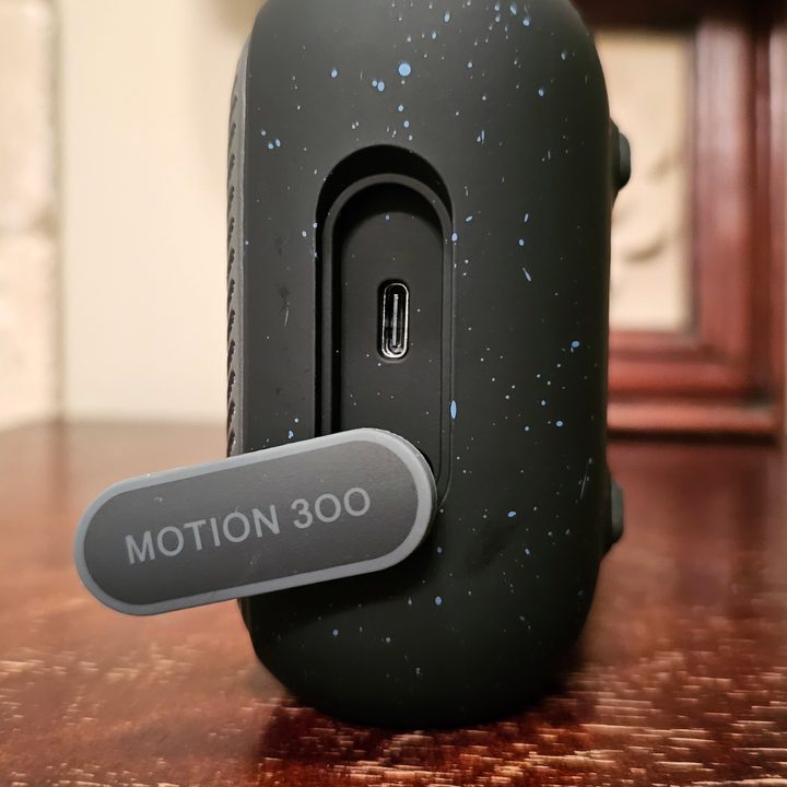 Soundcore Motion 300 USB-C port with cover removed.