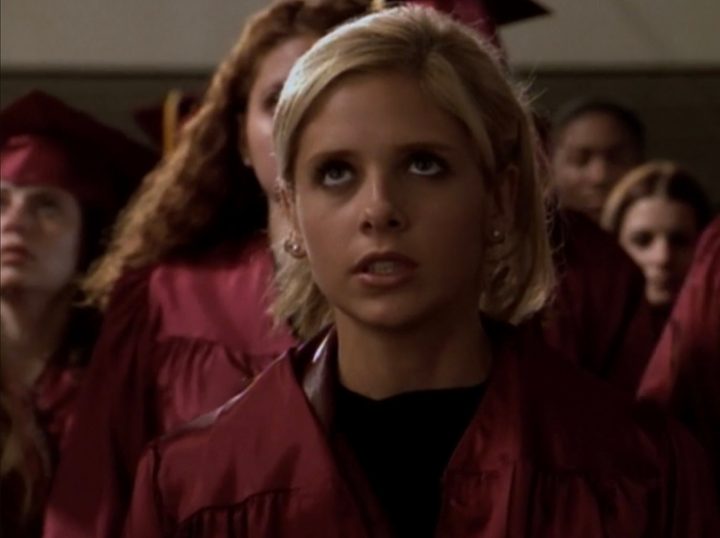 Buffy stands up with her entire graduating class behind her in Graduation Day, Part 2