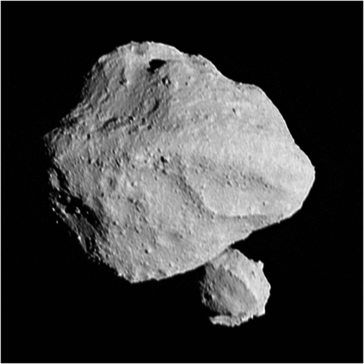 This image shows the “moonrise” of the satellite as it emerges from behind asteroid Dinkinesh as seen by the Lucy Long-Range Reconnaissance Imager (L’LORRI), one of the most detailed images returned by NASA’s Lucy spacecraft during its flyby of the asteroid binary. This image was taken at 12:55 p.m. EDT (1655 UTC) Nov. 1, 2023, within a minute of closest approach, from a range of approximately 270 miles (430 km). From this perspective, the satellite is behind the primary asteroid. The image has been sharpened and processed to enhance contrast.