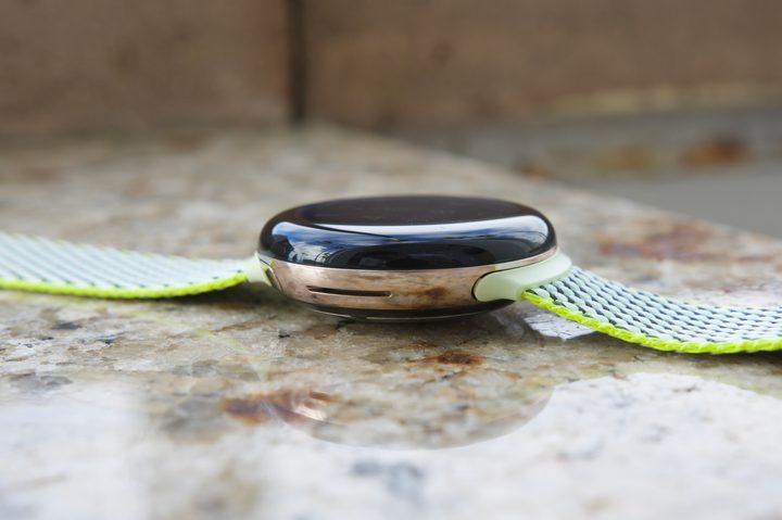 The Google Pixel Watch 2 resting on a table.