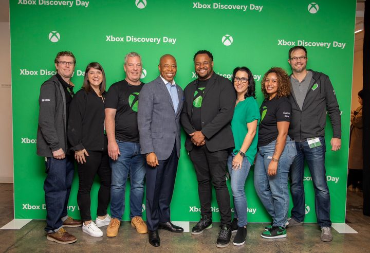 Eric Adams poses with Xbox team members.