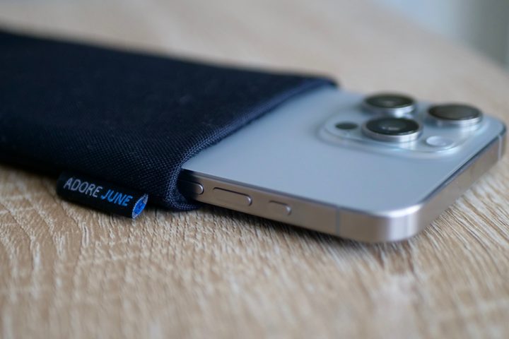 The iPhone 15 Pro Max inside the Adore June pouch.