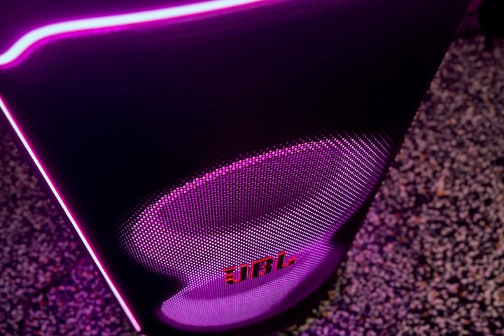 The purple glowing lights on the front of the JBL PartyBox Ultimate.