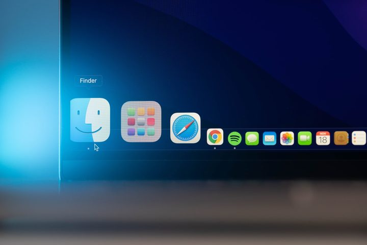 The Dock in macOS showing apps like Safari, Google Chrome, Spotify, the Finder, and more.