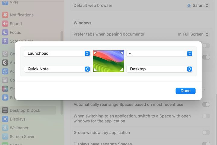 The Settings app in macOS Sonoma showing the Hot Corners set-up screen.
