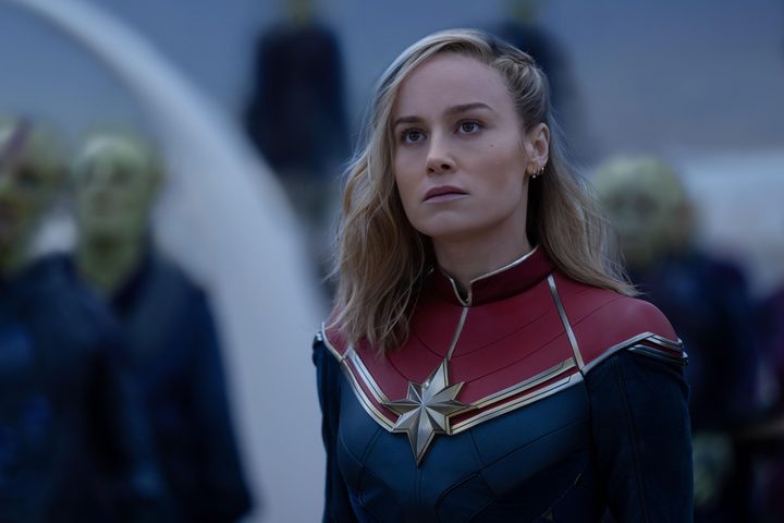 Captain Marvels looks up at the sky in The Marvels.