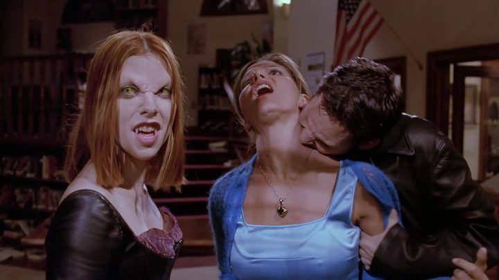 Vampire Willow snarls as Vampire Xander bites Cordelia in "The Wish"