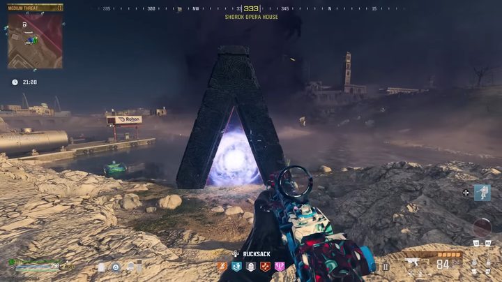 A triangle stone with a portal inside.