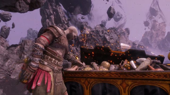 Kratos looting a chest in God of War: Valhalla.