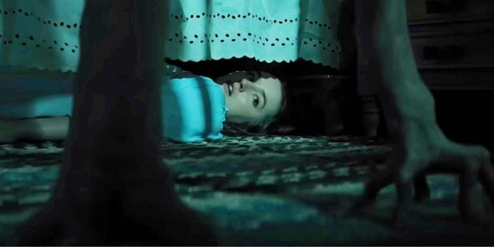A young girl hides from an alien in No One Will Save You