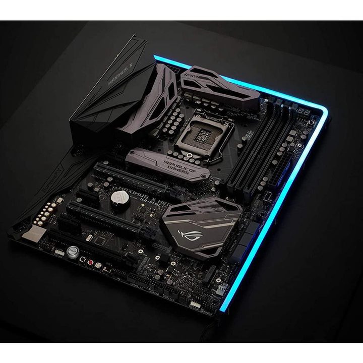 An Asus motherboard with a Phanteks NEON LED strip surrounding it.