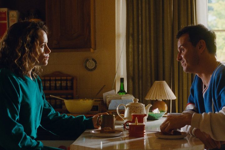 Claire Foy and Andrew Scott look at each other in All of Us Strangers.