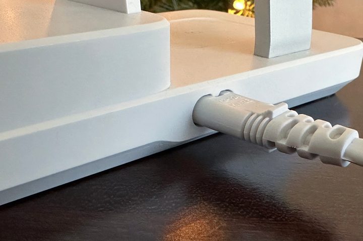 Closeup of power connector on back of ESR 6-in-1 charging stand.