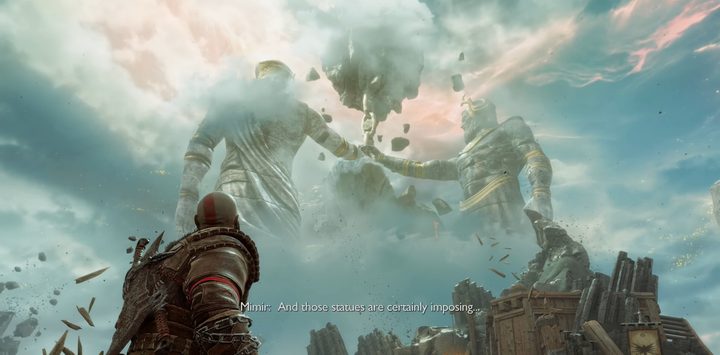 Kratos looking at two massive statues in the sky.,