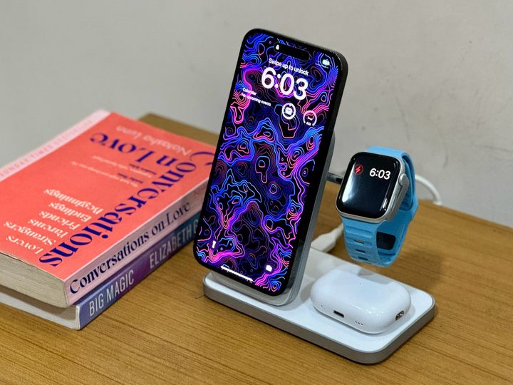 Nomad Stand One Max on bedside table.