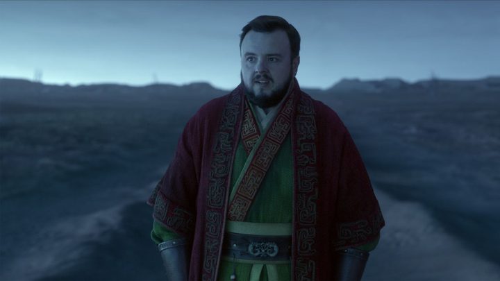 John Bradley as Jack Rooney standing in a desolate landscape in 3 Body Problem.