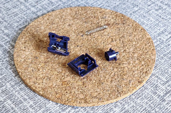 Disassembled factory pre lubed Kailh Phantom tactile low profile mechanical keyboard switch from Lofree Flow.