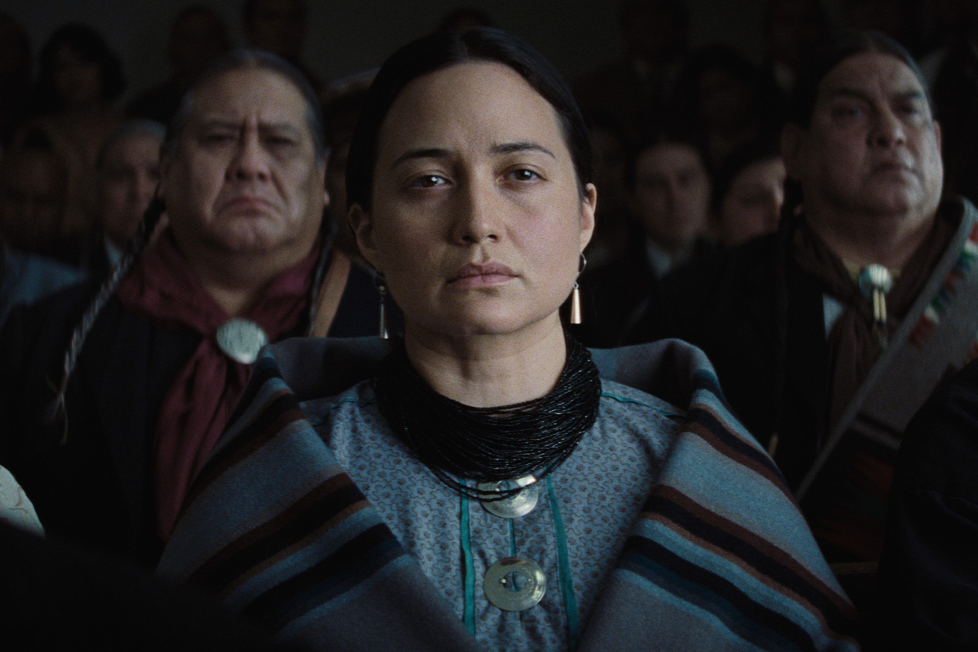 Lily Gladstone stares into the camera in a still from the movie Killers of the Flower Moon.