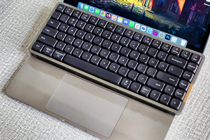 Lofree Flow low-profile mechanical keyboard on a 13-inch Apple MacBook Pro.