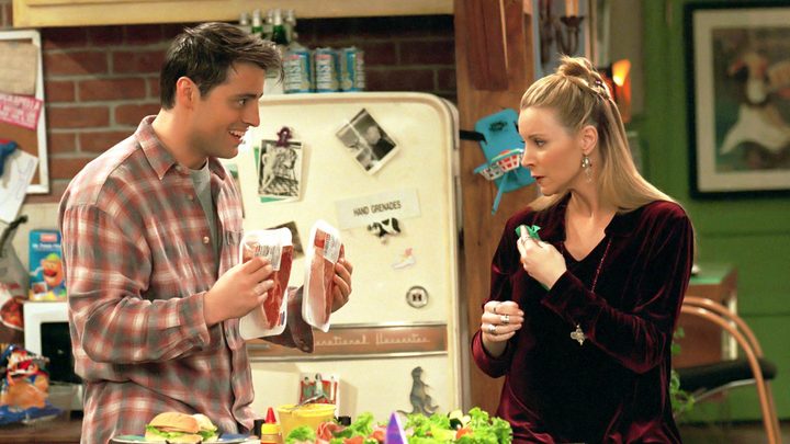 Joey showing two pieces of pastrami to Phoebe in Friends.